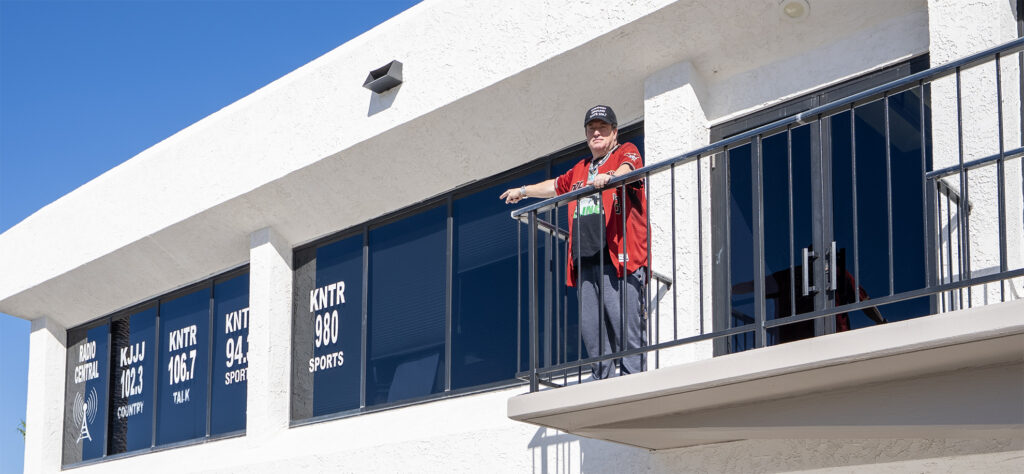 Scott Goodman standing out the KNTR offices.